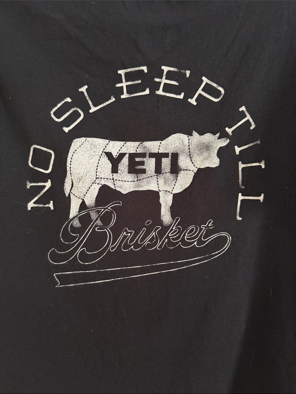 Yeti Black Short-Sleeve Tee with White Cow Brisket Graphic - size Small
